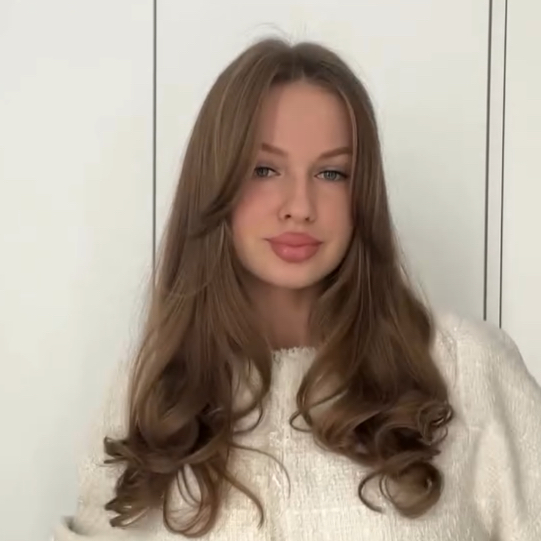 Мила