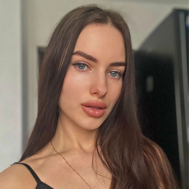 Мила