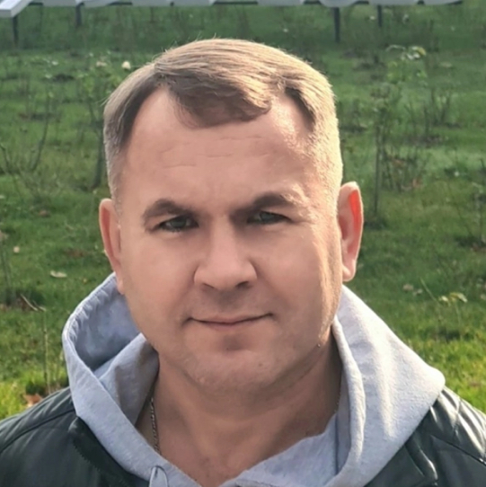 Николай