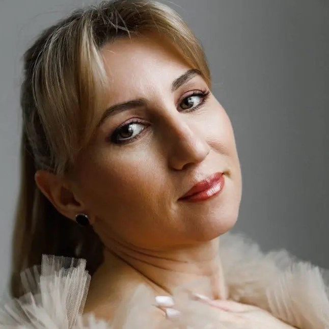 Марта К