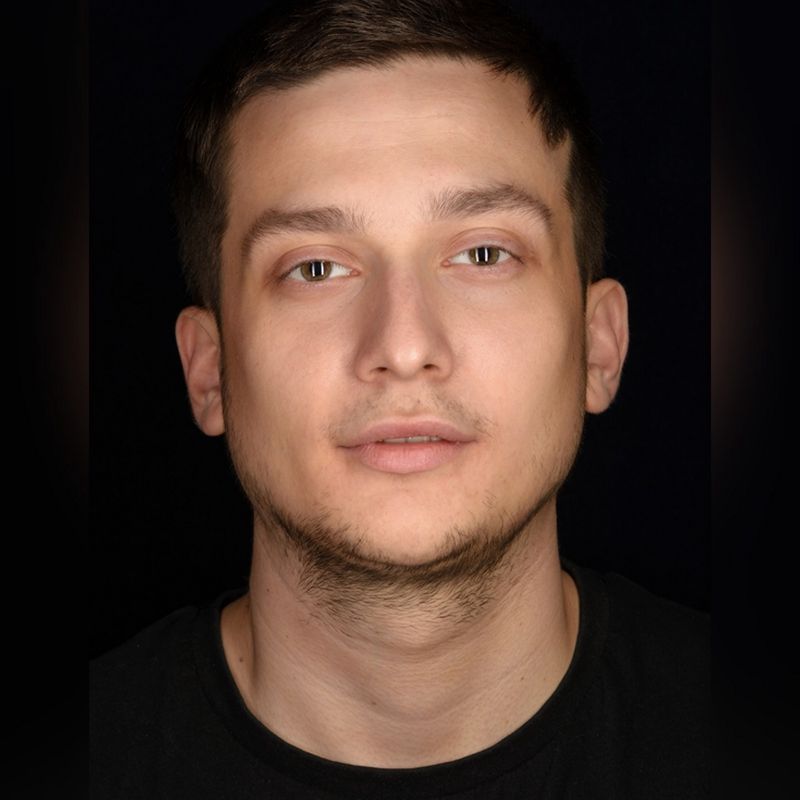 Николай