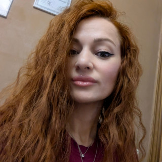 Мила